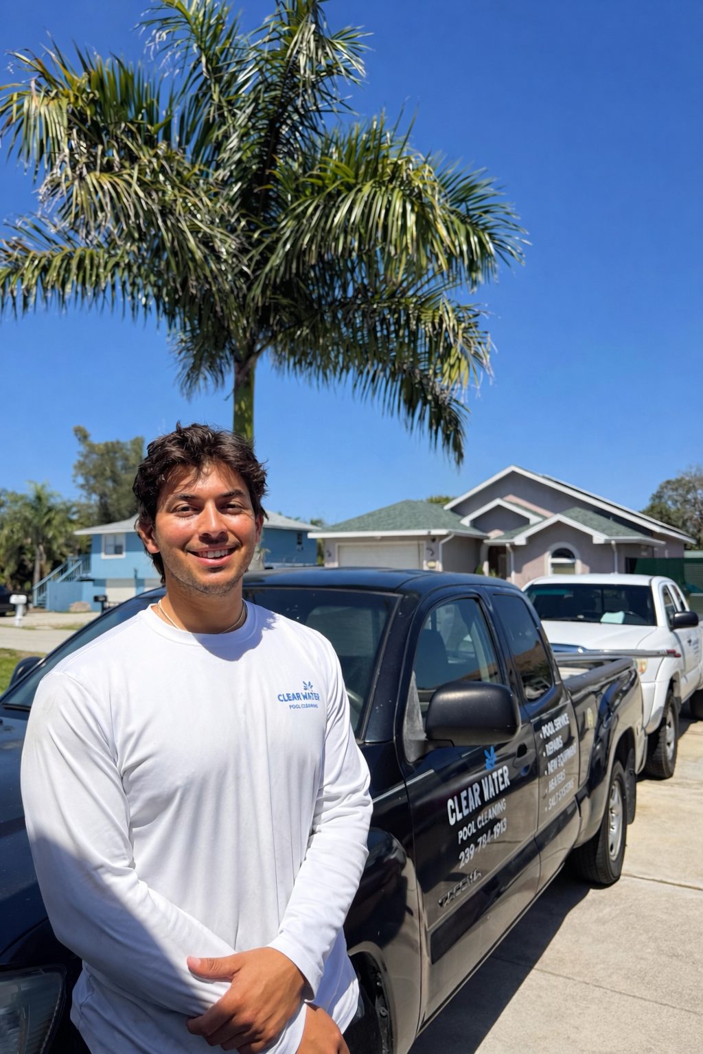 Remberto with Clear Water Pool Cleaning truck in Southwest Florida